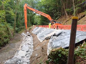 Supporting image for story: Watch: Work under way to stabilise A488 in Shropshire as road 'slips towards the river'