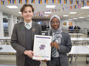 Colton Hills Youth Council representatives, Matviy and Alaa, proudly holding our Rainbow Flag Award. 