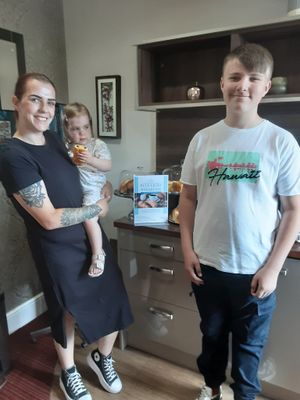 Harriet, an off-duty paramedic visiting the home with her children