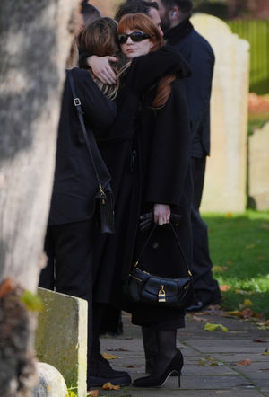 Nicola Roberts (right) arrives for the funeral service of One Direction singer Liam Payne at St Mary's Church in Amersham, Buckinghamshire.