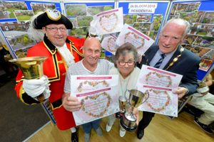 Roger Smith and Geoffrey Russell with James and Lillian Broadhurst, who won several first prizes including Best Overall Garden and Best Front Garden