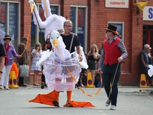 Supporting image for story: Ellesmere Carnival 2025: Swans glide majestically through town as hundreds turn out for fun in the sun