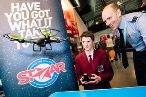 Flying a drone is Cian Onions, 16, with Flight Lieutenant Howard Fielder