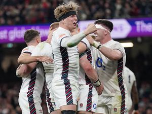 Henry Pollock celebrates