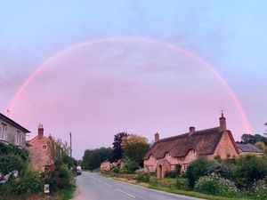 Supporting image for story: Pink rainbow lights up the sky