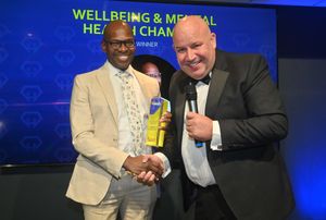 WOLVERHAMPTON COPYRIGHT NATIONAL WORLD STEVE LEATH 25/09/25Pics at the Molineux at the Black Country Heroes Awards event.   Dicky Dodd presents the Wellbeing and Mental Health Champion to: Christian Dixon.