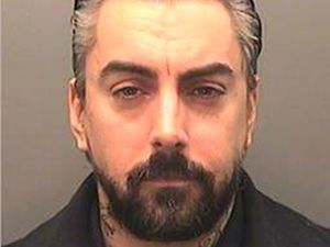 Supporting image for story: Two men in court charged with prison murder of disgraced rock star Ian Watkins