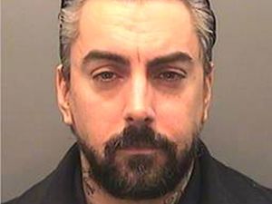 Supporting image for story: Two men in court charged with prison murder of disgraced rock star Ian Watkins