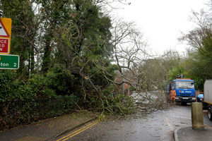 A fallen tree blocks the road on Compton Road West, Wolverhampton, next to Compton Care