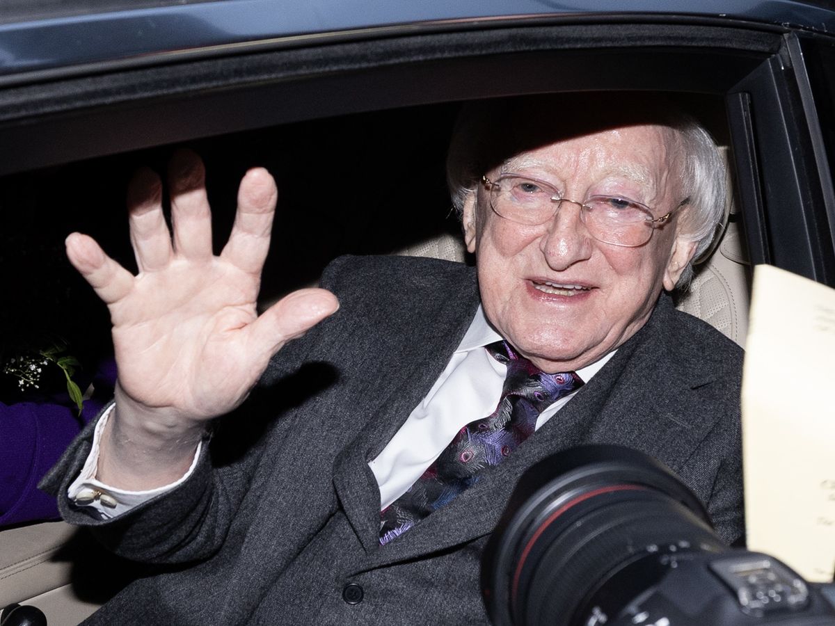 Michael D Higgins and Sabina given roses and cheered as term ends