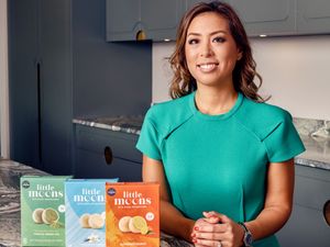 Little Moons founder Vivien Wong with three boxes