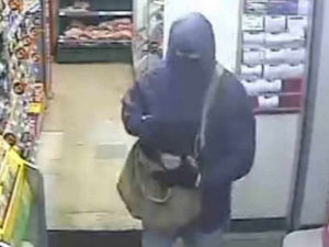 Supporting image for story: Police hunt armed robber in ski mask after Halesowen store raid
