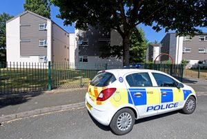 Police at the scene in Saint Thomas Close in Coalpool, Walsall