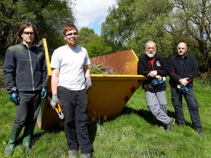 Supporting image for story: Volunteers clear barbed wire to protect animals in Telford