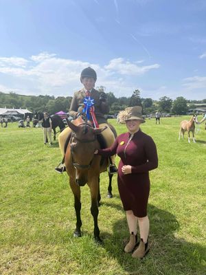 Reserve Champion, Thomas Ingram with Judge Tilly Powell
