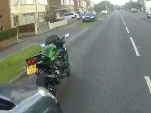 Supporting image for story: Biker comes off badly in road rage confrontation with taxi