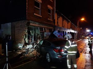 Supporting image for story: Police hunt driver after car crashes into front of Stafford shop