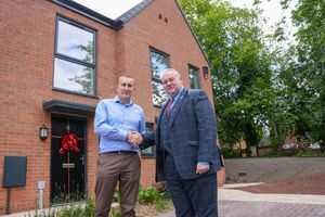 L-r - Morro Operations director Gavin Ward and Wolverhampton Council Leader Cllr Stephen Simkins in front of one of the new council houses on Ettingshall Road