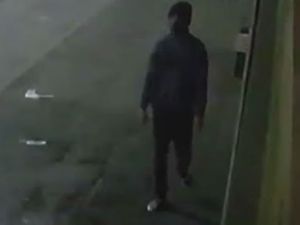 Supporting image for story: CCTV footage of murder suspect shows distinctive walk
