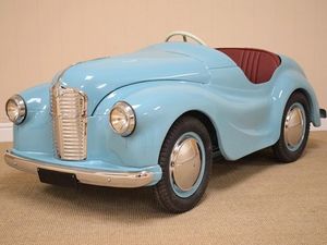 Supporting image for story: Restored pedal car raises thousands for charity