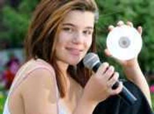 Supporting image for story: County songstress's plea for text votes