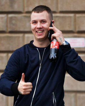 Tyrone Sadler smiles as he leaves court