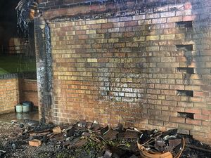 Supporting image for story: Firefighters rush to home near Bridgnorth after fire spreads from wood store to garage