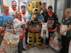 Supporting image for story: Telford Tigers hand out toys on children's ward