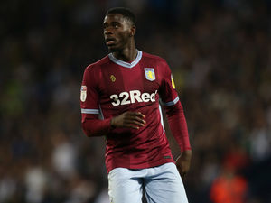 Supporting image for story: Ole Gunnar Solskjaer casts doubt over Aston Villa return for Axel Tuanzebe