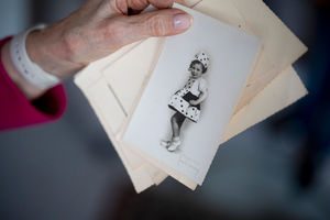 Holocaust survivor Annick Lever presents a photograph of herself as a child shown at her London home during an interview with the Press Association ahead of Holocaust Memorial Day. Picture date: Friday January 16, 2026. PA Photo. Photo credit should read: Jordan Pettitt/PA Wire