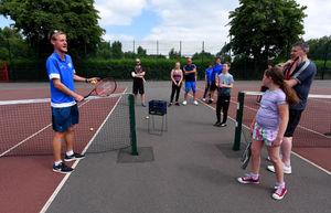 Coach James Perrin address the Tennis for Free session at Hednesford 
