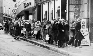 A queue for cheap televisions in Shrewsbury on November 11, 1981. The caption reads: 'It was like January sales time in Shrewsbury yesterday as a massive queue of hopeful bargain hunters snaked across The Square. They were attracted by a sale in the Music Hall of 100 overhauled ex-rental colour television sets from as little as £349.'