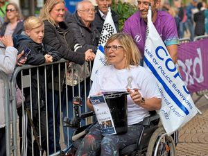Supporting image for story: GALLERY: Injured Pc Claire Bond cheered at Stafford 10k finish line 
