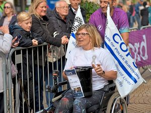Supporting image for story: GALLERY: Injured Pc Claire Bond cheered at Stafford 10k finish line 