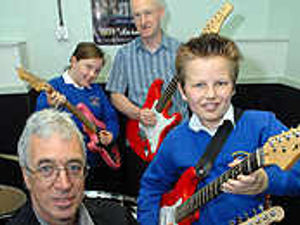Supporting image for story: Barrie and band helping equip school's studio
