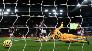 Manchester City's Sergio Aguero scores his side's fifth goal of the game during the Premier League match at Villa Park, Birmingham