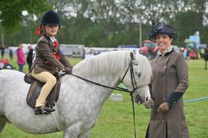 Grace Duncan, 6, on Jules, with Amy Simcox.