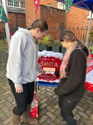 Posting that letter to Santa at Elf Lou's creation station on Sunday