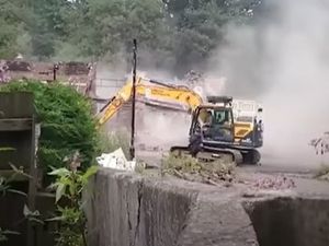 Supporting image for story: Plant hire firm that supplied excavator for Crooked House demolition enters liquidation