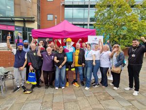 Friends, family and supporters offer a cheer for Manny Singh Kang as he prepares to get his solo ride underway