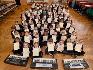 Supporting image for story: Pupils celebrate after achieving musicial distinction