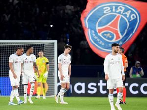 Aston Villa's players react to conceding a third goal to Paris St Germain