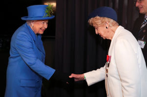 Queen Elizabeth II shakes hands with Bletchley Park veteran Ruth Bourne during a visit to Watergate House in London to mark the centenary of GCHQ, the UK's Intelligence, Security and Cyber Agency.
