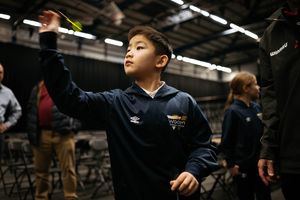 Bullseye Maths is a programme that the PDC have set up for Key Stage 2 students to use darts to help develop their numeracy skills. PDC is currently taking place at the WV Active Aldersley in Wolverhampton this week and darts players Mike de Decker and Jermaine Wattimena come to help out students from Woden Primary School.