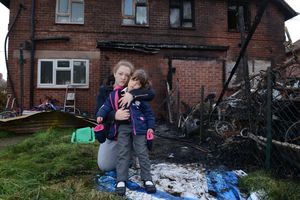 Kelly Jones and her daughter Madison fled their home when flames swept through the garden after a rogue firework hit their house