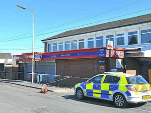 Supporting image for story: Woman is arrested over One Stop store robbery