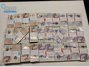 Supporting image for story: Police seize £150,000 in cash from criminal's car boot