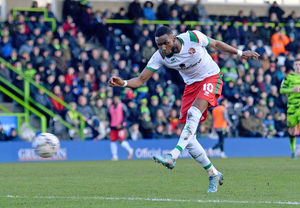 Emmanuel Osadebe goes for goal