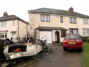 Supporting image for story: Caravan gutted and cars damaged in fire