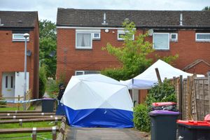 A police tent up as an investigation was launched into an attack